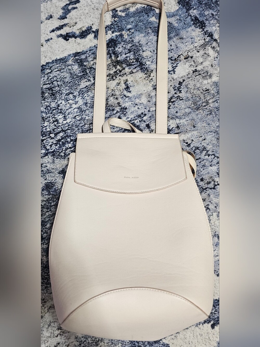 Pixie Mood convertible backpack in a soft cream vegan leather.